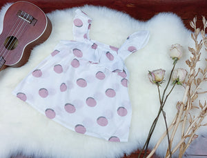 Sleeveless polka dot blouse